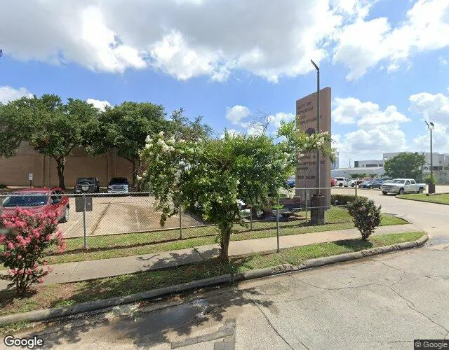 Exterior view of Houston treatment center — tree